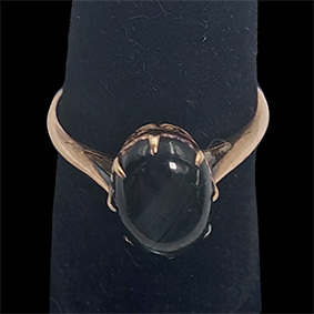 Gouden ring 14 krt  met zwarte saffier