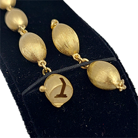 Gouden 14 kt armband met unieke balletjesschakels Marco Bicego stijl