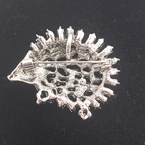 Glanzende egelbroche